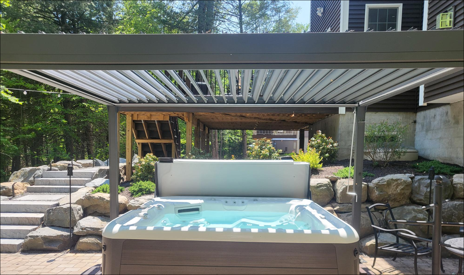 retractable awning over a hot tub
