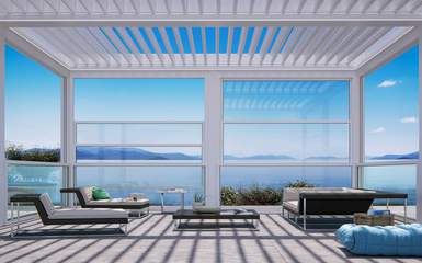 A white pergola with a louvered roof